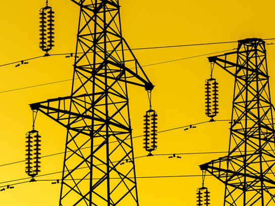 Elstolpar mot gul bakgrund