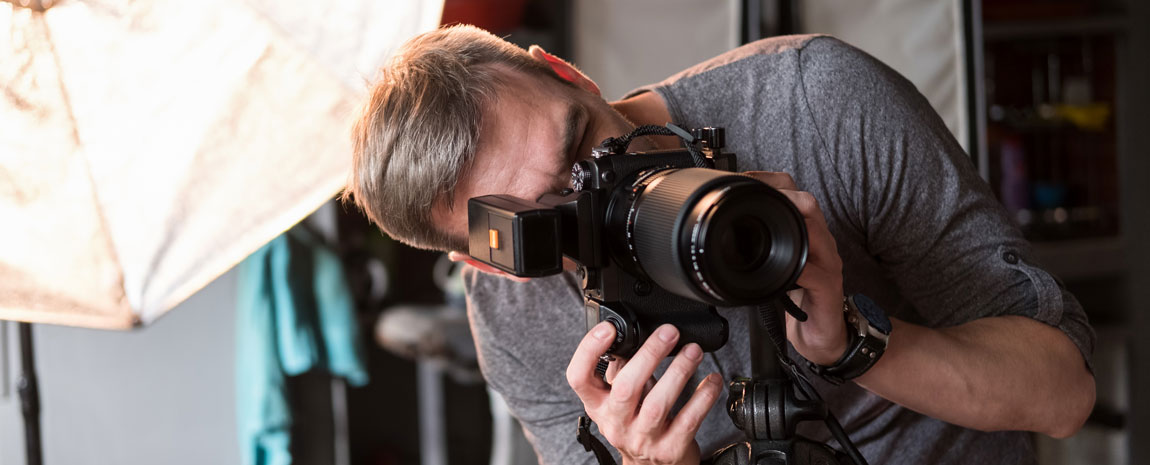 Fotograf som tar en bild