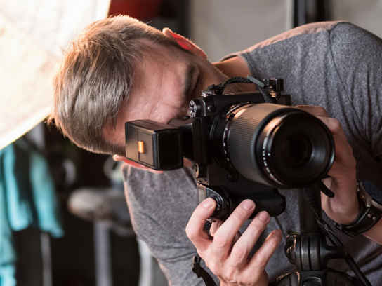 Fotograf som tar en bild